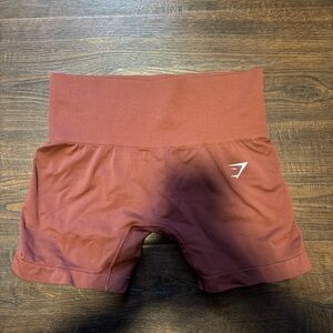 Red gym, shark shorts